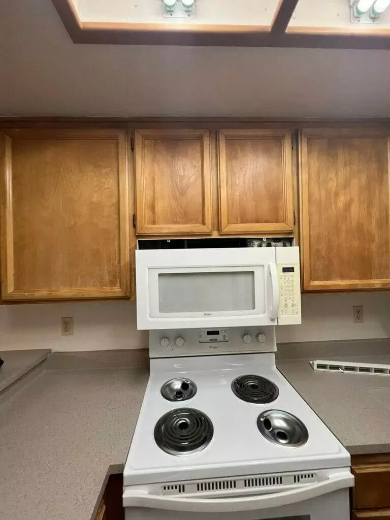 white cabinets, microwave oven