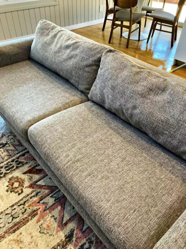 Gray couch, living room, rug