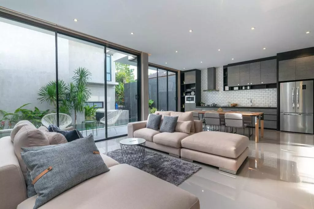 A modern living room with sliding glass doors, perfect for Airbnb guests.